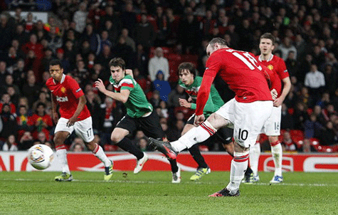 Rooney ghi bàn thành công từ quả sút 11 m giúp M.U vẫn còn cơ hội ở Europa League - Ảnh: AFP