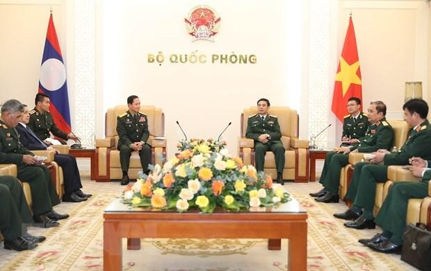 Bộ trưởng Bộ Quốc phòng Phan Văn Giang tiếp Tổng Tham mưu trưởng Quân đội nhân dân Lào Khamliang Outhakaysone. (Ảnh: Trọng Đức/TTXVN) ảnh 3