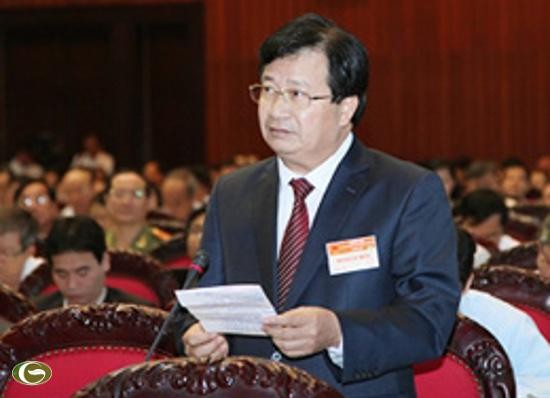 Bộ trưởng Trịnh Đình Dũng phát biểu trước Quốc hội trong phiên họp sáng 31/10. (Ảnh: VGP/Nhật Bắc)