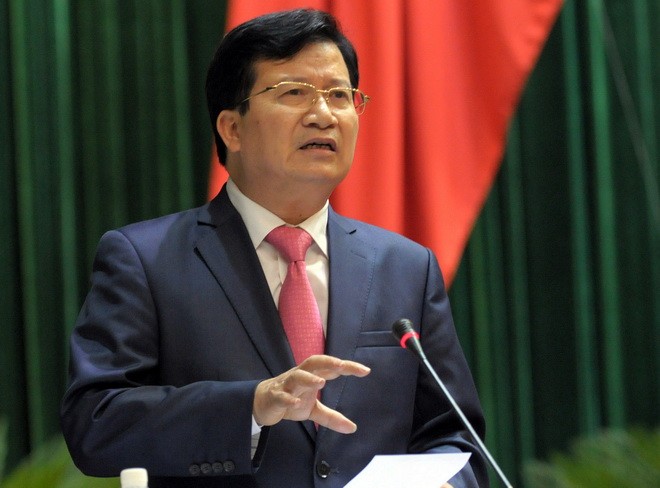 Bộ trưởng Bộ Xây dựng Trịnh Đình Dũng (Ảnh: Việt Dũng)