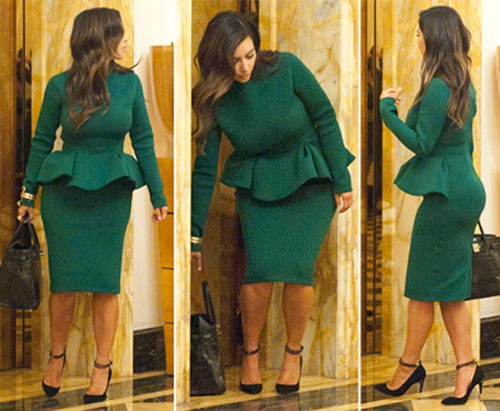 Kim Kardashian đi mua sắm trước khi đi ăn tối với bạn trai tại Rome ngày 18/10/2012. Bộ váy xanh này trông thân hình cô béo tròn
