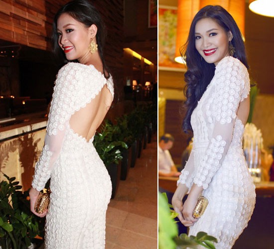 Hoa hậu Thuỳ Dung khoe vóc dáng hình chữ S trong chiếc váy ren trắng điệu đà