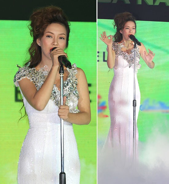 Đinh Hương lộng lẫy với bộ đầm trắng bó sát đứng biểu diễn trên sân khấu