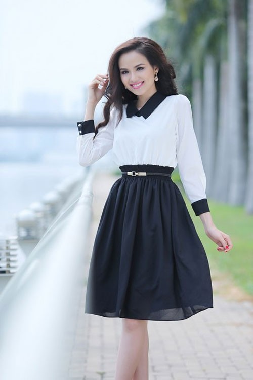 Bạn gái sẽ có được vẻ đẹp dịu dàng như Diễm Hương nếu chọn sơ mi trắng kết hợp váy đen.