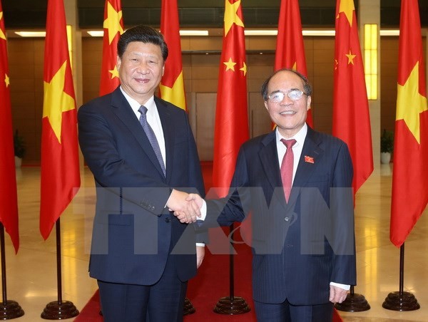 Chủ tịch Quốc hội Nguyễn Sinh Hùng hội kiến Tổng Bí thư, Chủ tịch nước Trung Quốc Tập Cận Bình đang có chuyến thăm cấp Nhà nước tới Việt Nam. (Ảnh: Nhan Sáng)