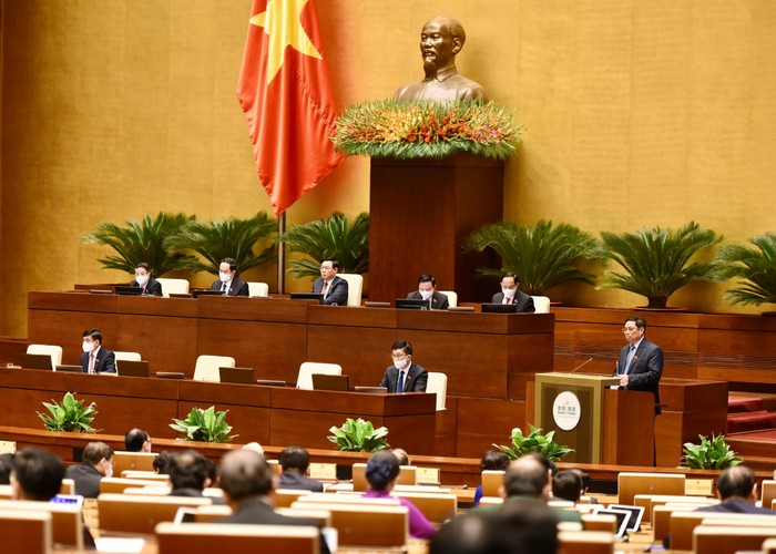 Thủ tướng Phạm Minh Chính trình bày báo cáo trước Quốc hội vào sáng 20/10 - Ảnh: VGP/Nhật Bắc