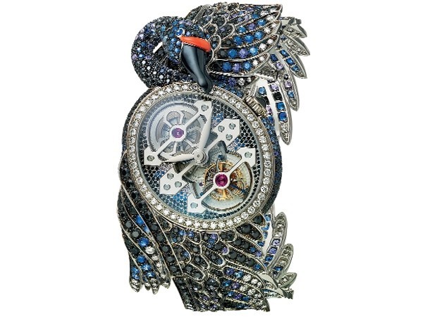 3. Boucheron Chiếc đồng hồ tuyệt đẹp này được sản xuất bởi hãng đồng hồ cao cấp của Thụy Sĩ Girard-Perregaux. Mỗi phần trong chiếc đồng hồ đều được chế tác bằng tay và được đánh bóng lên đến năm lần để có được độ tinh xảo nhất. Đồng hồ Boucheron được làm từ đá Spinel đen, kim cương, ngọc bích xanh và tím. Ngoài ra, nếu để ý kĩ sẽ thấy chiếc mỏ chim được làm bởi đá mã não đen và san hô.