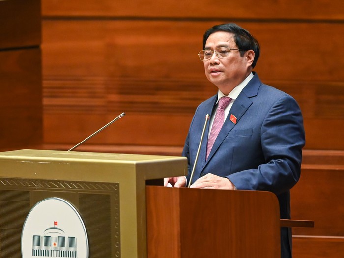 Thủ tướng Chính phủ Phạm Minh Chính trình bày Báo cáo đánh giá kết quả thực hiện kế hoạch phát triển kinh tế-xã hội năm 2022, dự kiến kế hoạch phát triển kinh tế - xã hội năm 2023. Ảnh: Cổng thông tin điện tử Quốc hội