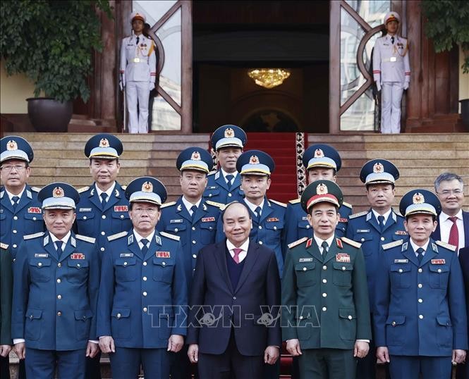 Chủ tịch nước Nguyễn Xuân Phúc với các đại biểu. Ảnh: Thống Nhất/TTXVN