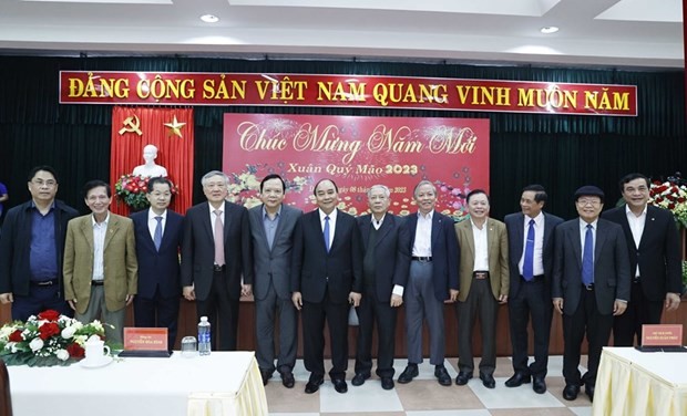 Chủ tịch nước Nguyễn Xuân Phúc và các đại biểu. (Ảnh: Thống Nhất/TTXVN)