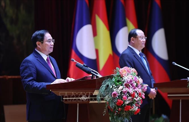 Thủ tướng Phạm Minh Chính phát biểu tại Lễ tổng kết Năm Đoàn kết hữu nghị Việt Nam - Lào, Lào - Việt Nam 2022. Ảnh: Dương Giang/TTXVN