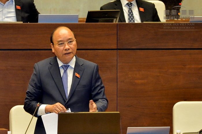 Thủ tướng Nguyễn Xuân Phúc trả lời chất vấn các đại biểu Quốc hội chiều 18/11. Ảnh: Quochoi.vn
