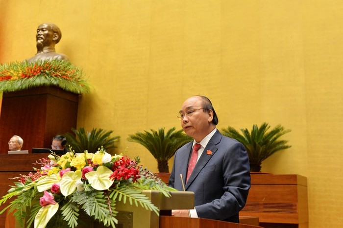 Thủ tướng Nguyễn Xuân Phúc trình bày báo cáo trước Quốc hội, đồng bào và cử tri cả nước. Ảnh: Quochoi.vn