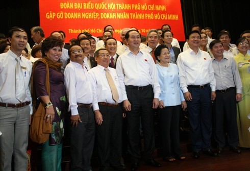 Chủ tịch nước Trần Đại Quang và cộng đồng doanh nghiệp, doanh nhân TP.Hồ Chí Minh (ảnh: P.L)