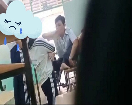 Cảnh học sinh bị quỳ và tát giữa lớp (ảnh cắt từ video clip)