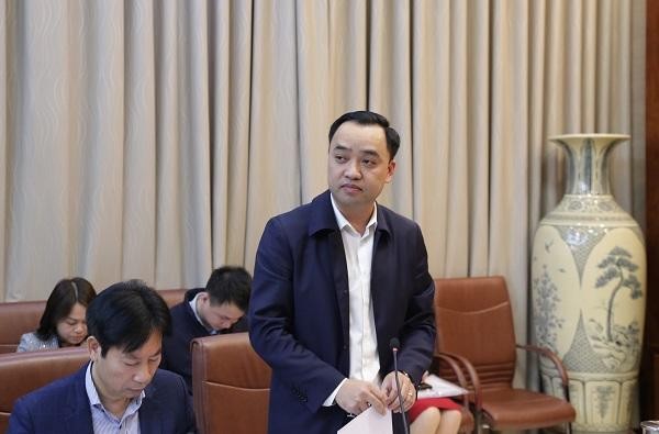 Ông Nguyễn Văn Cường - Phó Chủ tịch chuyên trách Hội đồng quản lý Bảo hiểm xã hội phát biểu tại kỳ họp.