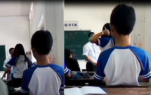Ảnh cắt từ video ghi lại cảnh thầy giáo và nữ sinh đánh nhau trong lớp học ở Hậu Giang. (Ảnh đăng trên Báo Công an Nhân dân)