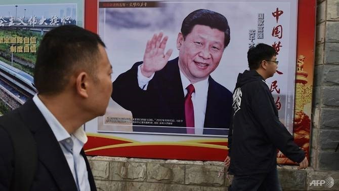 Một poster ở Trung Quốc với dòng chữ “Giấc mơ Trung Hoa, Giấc mơ của nhân dân” (Ảnh: Reuters)