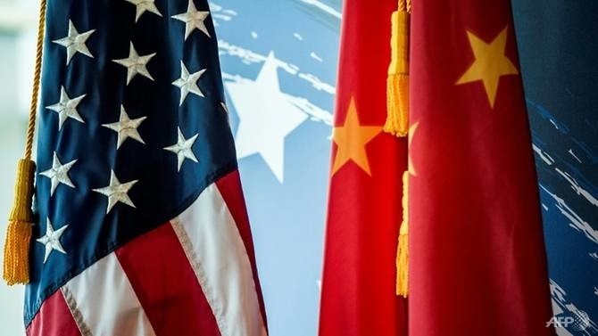 Quốc kỳ của Hoa Kỳ và Trung Quốc (Ảnh: Reuters)