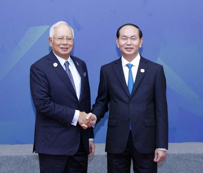 Chủ tịch nước Trần Đại Quang đón Thủ tướng Malaysia Najib Razak đến dự Đối thoại.
