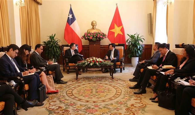 Phó Thủ tướng, Bộ trưởng Bộ Ngoại giao Phạm Bình Minh tiếp Bộ trưởng Bộ Ngoại giao Cộng hòa Chile. Ảnh: Dương Giang/TTXVN