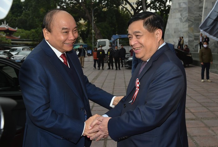 Thủ tướng Nguyễn Xuân Phúc và Bộ trưởng Bộ Kế hoạch và Đầu tư Nguyễn Chí Dũng. Ảnh: VGP/Quang Hiếu