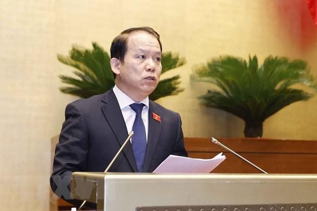 Chủ nhiệm Ủy ban Pháp luật của Quốc hội Hoàng Thanh Tùng trình bày Báo cáo thẩm tra dự án Luật Thực hiện dân chủ ở cơ sở. (Ảnh: Doãn Tấn/TTXVN)