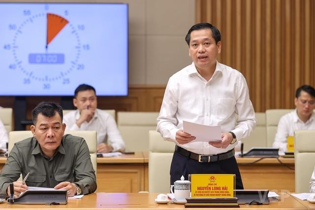 Bí thư Đảng ủy Khối doanh nghiệp Trung ương Nguyễn Long Hải báo cáo tại cuộc làm việc - Ảnh: VGP/Nhật Bắc