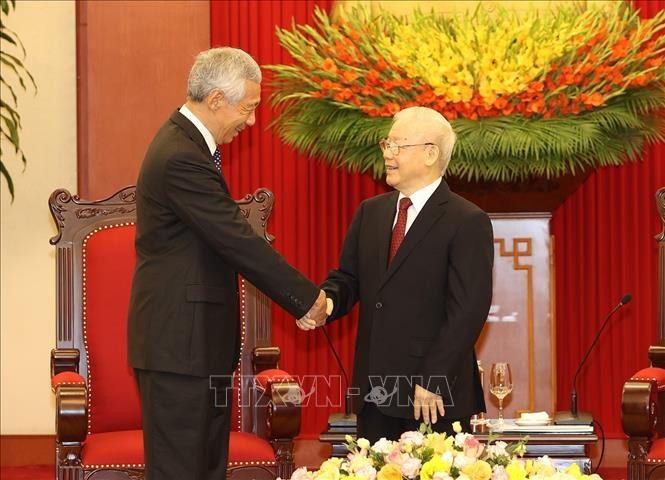 Tổng Bí thư Nguyễn Phú Trọng tiếp Thủ tướng Singapore Lý Hiển Long. Ảnh: Trí Dũng/TTXVN