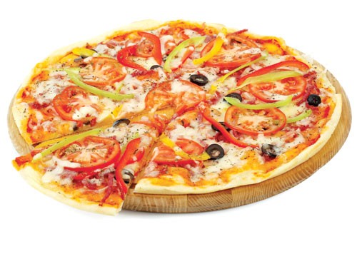 Hạn chế ăn pizza... sát giờ ngủ - Ảnh: Shutterstock