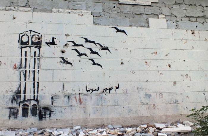 Syria đổ nát, tan hoang, chết chóc và đau thương vì nội chiến những ngày tháng 7, tháng 8/2012