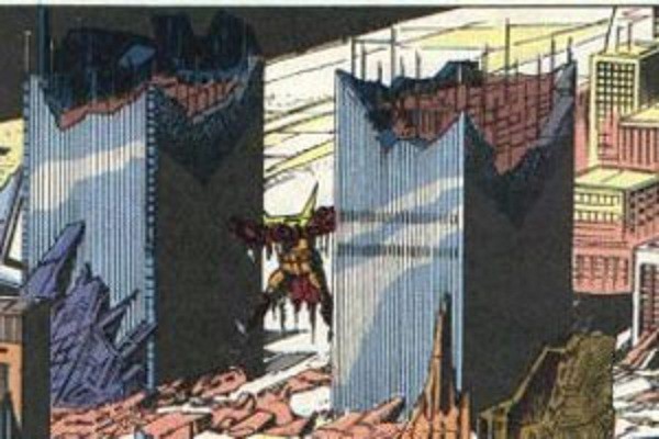 Optimus Prime bị mắc giữa các tòa tháp bị phá hủy trong truyện tranh "Transformers".
