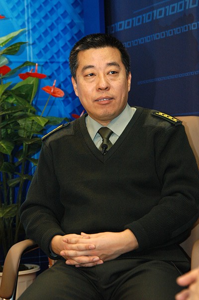 Tướng học giả quân sự Trần Hổ khi còn là Đại tá, Tổng biên tập tạp chí "Quân sự thế giới" Trung Quốc.