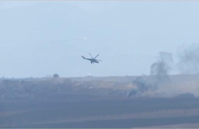 Máy bay trực thăng Mi-24 Nga tấn công lực lượng vũ trang chống chính phủ ở Syria
