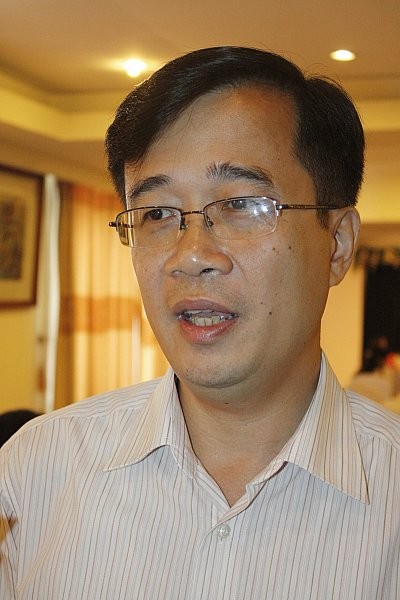 Ông Trần Quang Huy: Muốn xóa bỏ định kiến của xã hội nhìn nhận các trường ĐH, CĐ NCL cần có lộ trình và dần dần. Ảnh Xuân Trung