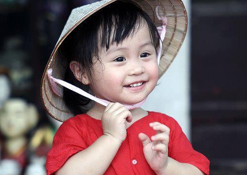 "Nụ cười và chiếc nón lá Việt Nam" là tên mà Facebook Tran Anh đặt cho bức ảnh này