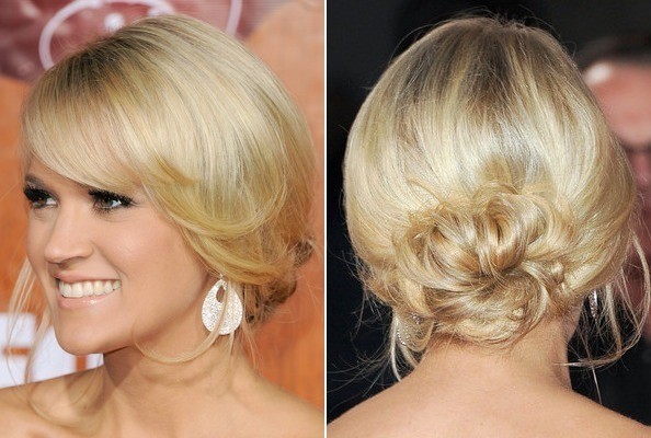 Carrie Underwood sở hữu mái tóc vàng óng tuyệt đẹp nên khi búi đơn giản sau gáy và để rủ tự nhiên ở phần mái đã đủ khiến phái mạnh ngẩn ngơ.