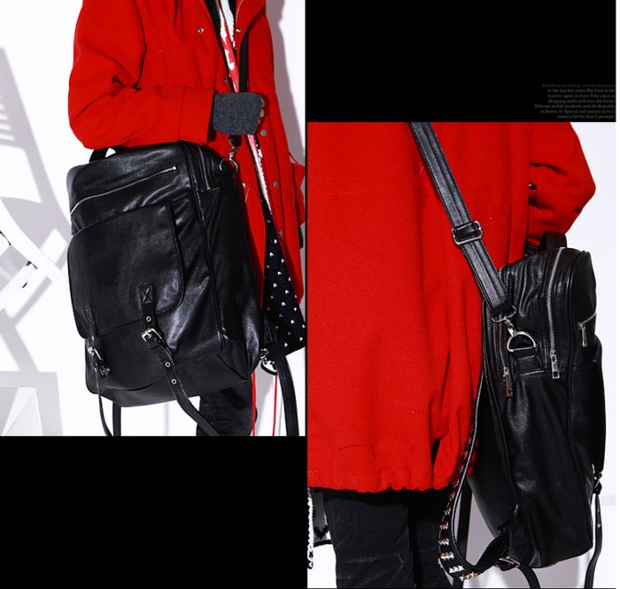 Túi khoác đeo bên hông màu đen với những dây trang trí tạo cảm giác bắt mắt.