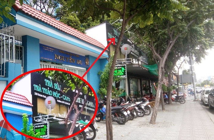 Trường Trung học phổ thông Nguyễn Du và kios bị trưng dụng. (Ảnh: H.L)