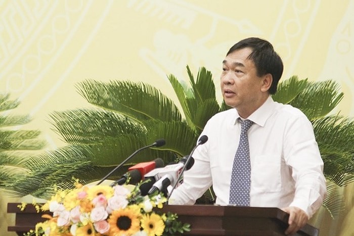 Ông Lê Văn Dục - Giám đốc Sở Xây dựng Hà Nội trả lời chất vấn. (Ảnh: An ninh Thủ đô)