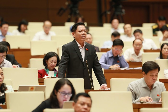 Bộ trưởng Bộ Giao thông vận tải - ông Nguyễn Văn Thể báo cáo trước Quốc hội. Ảnh: Quochoi.vn