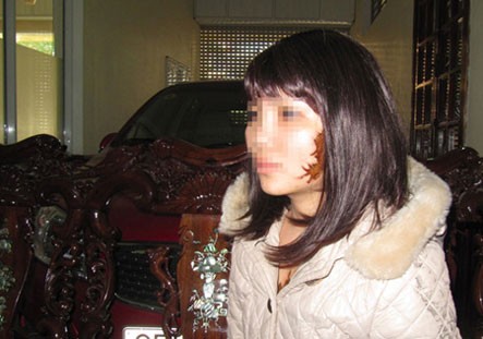 Cô gái Nguyễn Thị G và hình xăm hình quái thú trên mặt