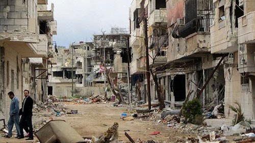 Cảnh tan hoang hiển hiện khắp thành phố Homs và Idle. Ảnh: AFP.