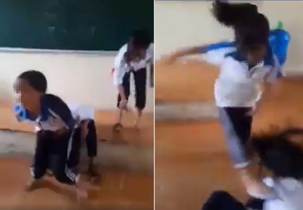 Nữ sinh đánh nhau ngay trên bục giảng (Ảnh cắt ra từ clip)