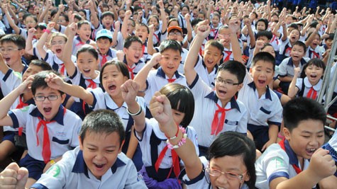 Các em học sinh Trường tiểu học Nguyễn Văn Trỗi, Q.4, TP.HCM - Ảnh: TTO