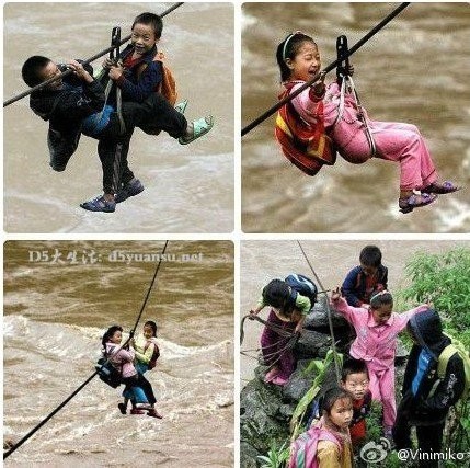 Trẻ em miền núi Trung Quốc trước khi học kiến thức đã phải học "làm xiếc" đu dây qua sông mùa lũ đến