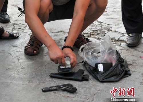 Khẩu súng cảnh sát Trùng Khánh, Trung Quốc đã dùng để tiêu diệt tên tội phạm giết người hàng loạt