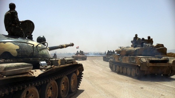 Quân chính phủ Syria và lực lượng vũ trang Hezbollah tiến vào thành Homs.