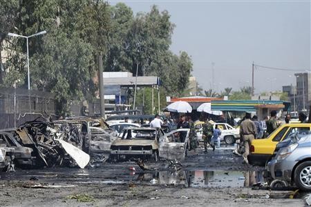 Hiện trường vụ đánh bom xe hôm thứ Năm tại Baghdad.