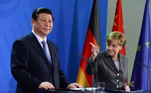 Chủ tịch Trung Quốc Tập Cận Bình và Thủ tướng Đức Angela Merkel trong cuộc họp báo chung ngày hôm qua tại Berlin.